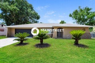 Building Photo - 4 Bedroom Pet-Friendly Home in ORLANDO, FL with Main Street Renewal