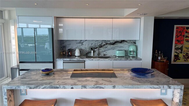 Building Photo - 6301 Collins Ave