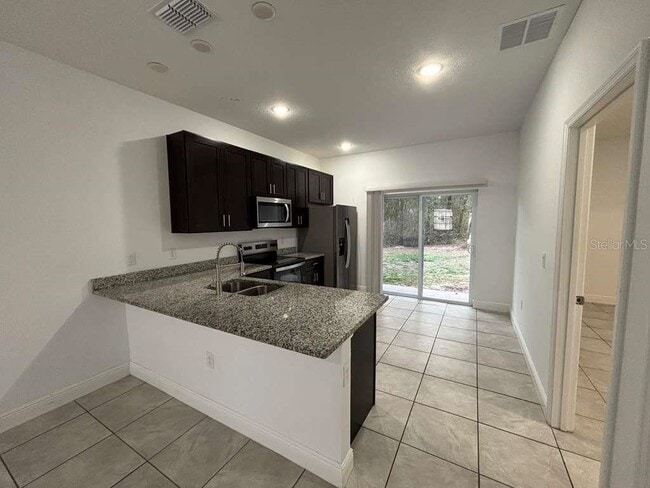 Building Photo - 9130 N Mendoza Way