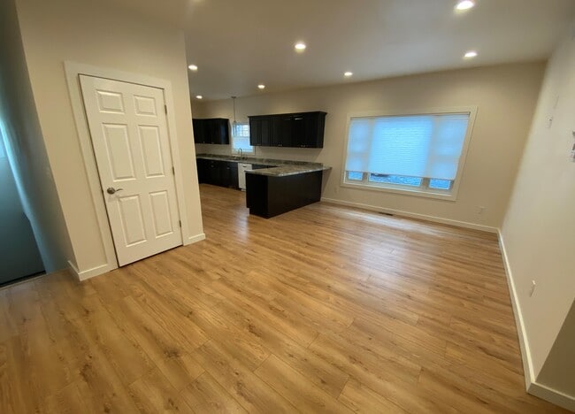 Living area & Coat closet - 214 S Minnesota Ave