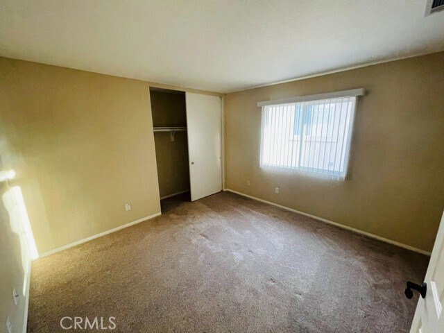 Building Photo - 42020 Dahlia Way