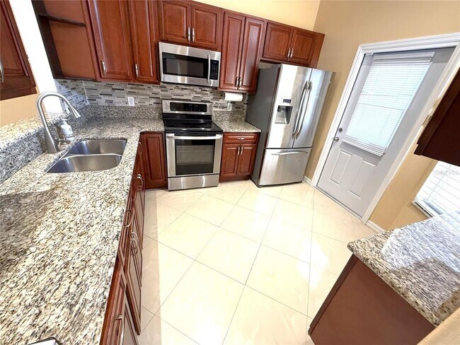 Building Photo - 9217 Valencia Palms Dr