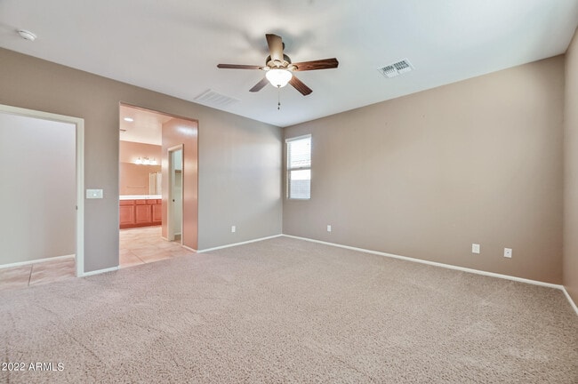 Building Photo - 8767 W Fleetwood Ln