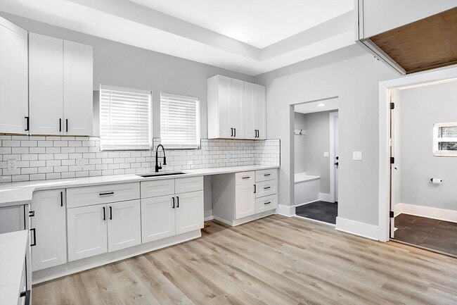 Building Photo - MOVE IN SPECIAL - Modern, Chic and brand new 2 bedroom with an office -   Discover This Home That...