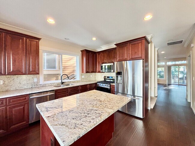 Building Photo - Modern New Construction 4b3b Townhome