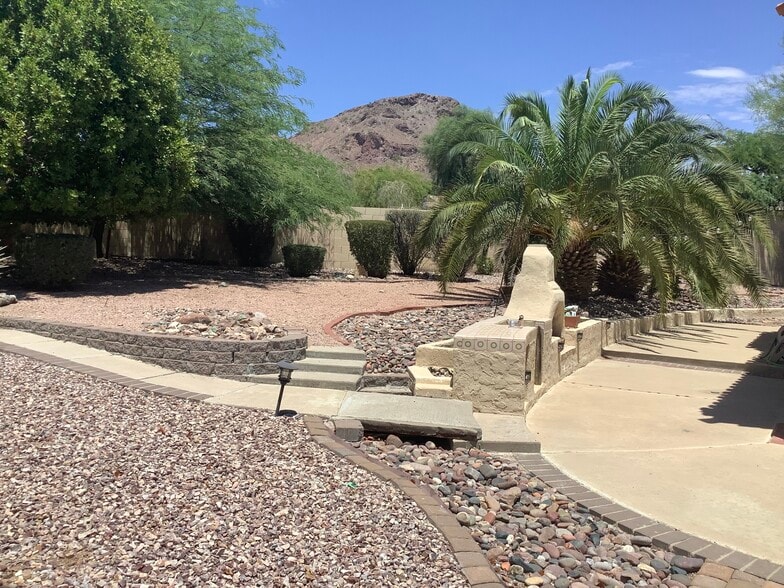 Entertain or enjoy the views from spacious backyard with fireplace - 1502 E Estrid Ave