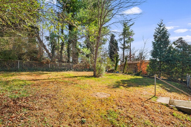 Building Photo - Modest East Asheville 3-Bedroom with Garage & Fenced-In Backyard