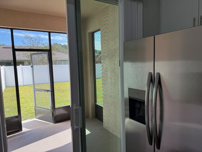 Building Photo - Brand New 3 Bedroom, 2 Bathroom Townhome with 1-Car Garage, Screened Porch & FULLY PRIVATE Fenced...