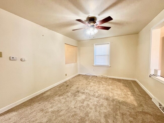 Building Photo - Cozy Home with Private Backyard & Detached...