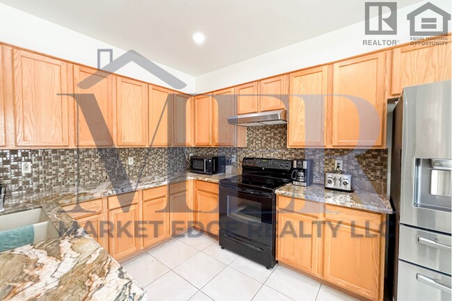 Building Photo - 4Bed/2Bath Furnished Home w/3 Car Garage! ...