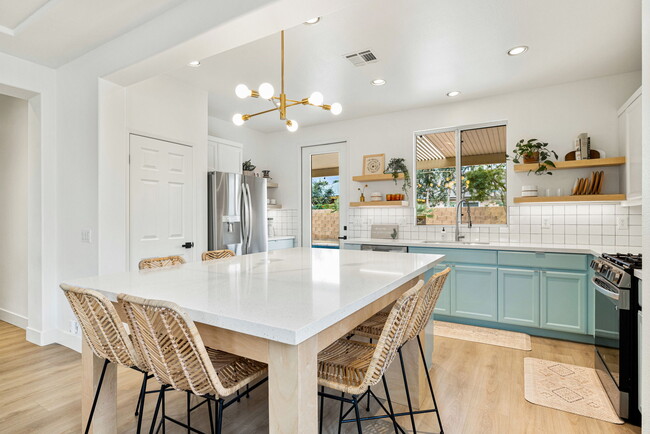 Entertain the entire family around this custom counter top. - 80663 Martinique Ave