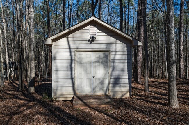 Building Photo - Move-In Ready Brick Ranch on Wooded Acre in Hampton Woods!