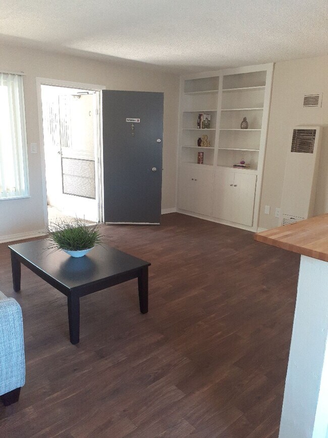 Building Photo - Welcome home to Seabreeze Garden Apartments