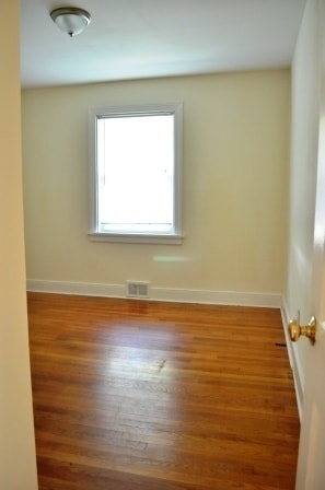 Building Photo - 3 BR/ 1 BA Lakeside Three bedroom with large fenced yard and detached garage/workshop