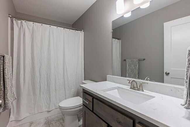 Building Photo - Modern 4BD/3BA Rental with Garage & Fenced...