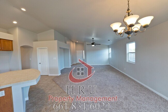 Building Photo - SW-Bakersfield  features 4 bed 2 bath with solar panels