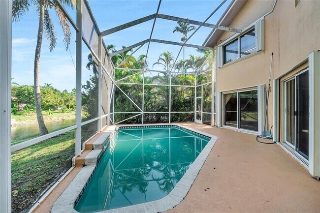 Building Photo - 5911 NW 59th Ave