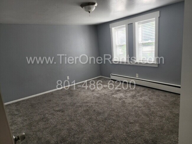 Building Photo - NO DEPOSIT option available for qualified ...