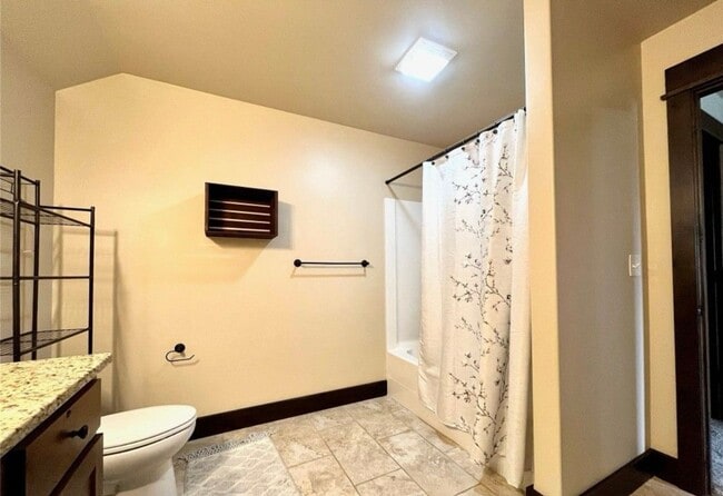 Building Photo - Charming 4-Bedroom Home with Spacious Lawn...