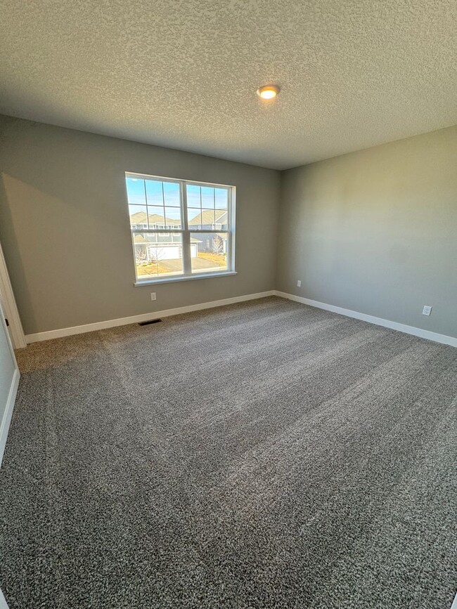 Building Photo - Brand-New 4-Bedroom Home with Modern Finis...