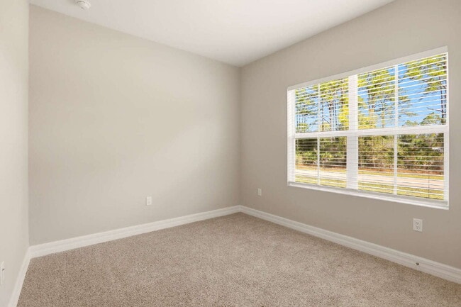 Building Photo - Brand New 4-Bedroom Gem with 2 Full Baths on Large Lot in Lehigh Acres – A Perfect Family Haven!