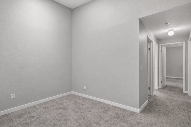 Building Photo - 2BR Condo w/ Vaulted Ceilings, W/D, Parking & Amenities