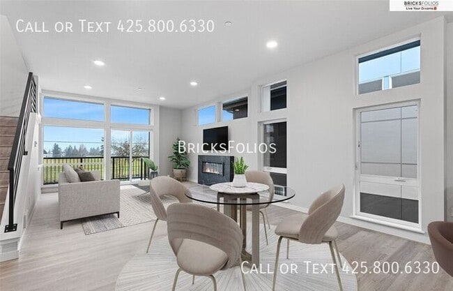 Building Photo - Move-In Ready Townhome with Ground Floor Suite & Views of Olympic Mountains