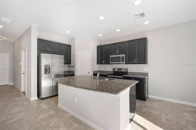 Building Photo - 7042 Summer Holly Pl