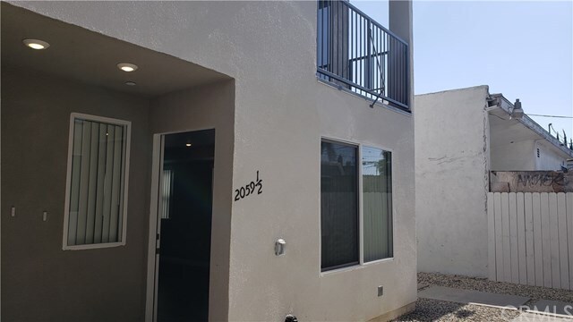 Building Photo - 2059 W Florence Ave