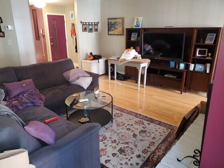 Living room with fireplace (from back door) - 1429 Corcoran St NW
