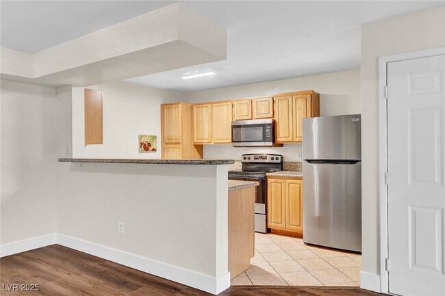 Building Photo - 5055 W Hacienda Ave