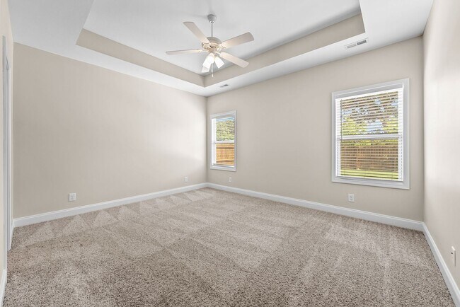 Building Photo - Pet Friendly Three Bedroom with Bonus!