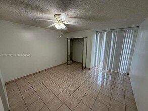 Building Photo - 10000 NW 80th Ct