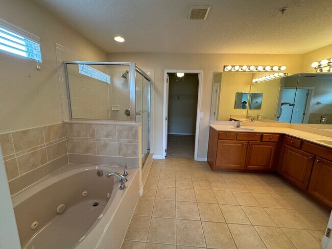 Building Photo - WELL MAINTAINED 4 BDRM 3.5 BATH HOME LOCATED IN EAST PARK/LAKE NONA