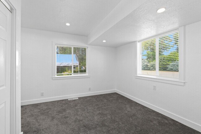 Building Photo - Complete Rebuild Modern Finishes 3 Bedroom 2 Bath Spokane Valley Home fenced backyard