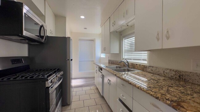 Building Photo - North Park 2BR w/ Private Patio, Walkable Location & Free Parking + $250 Move-In Credit