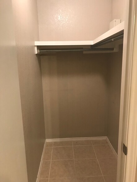 Walk in closet in bedroom. - 1801 Lexington Circle