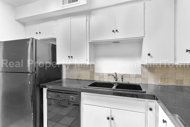 Building Photo - Live Elevated in the Heart of Viridian – S...