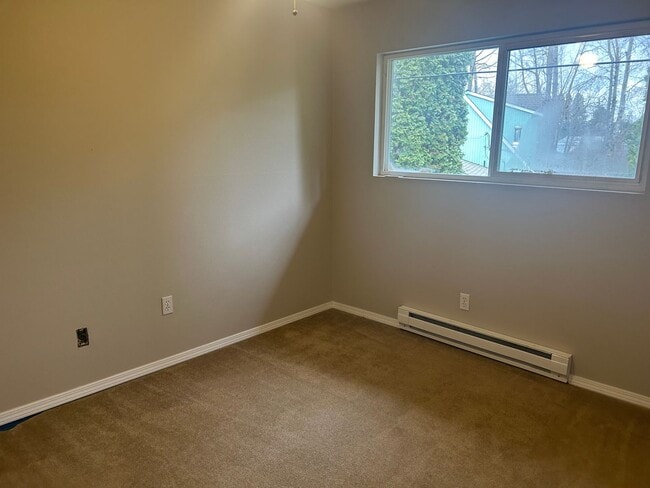 Building Photo - 2 bedroom Townhome-style living with no neighbors above or below