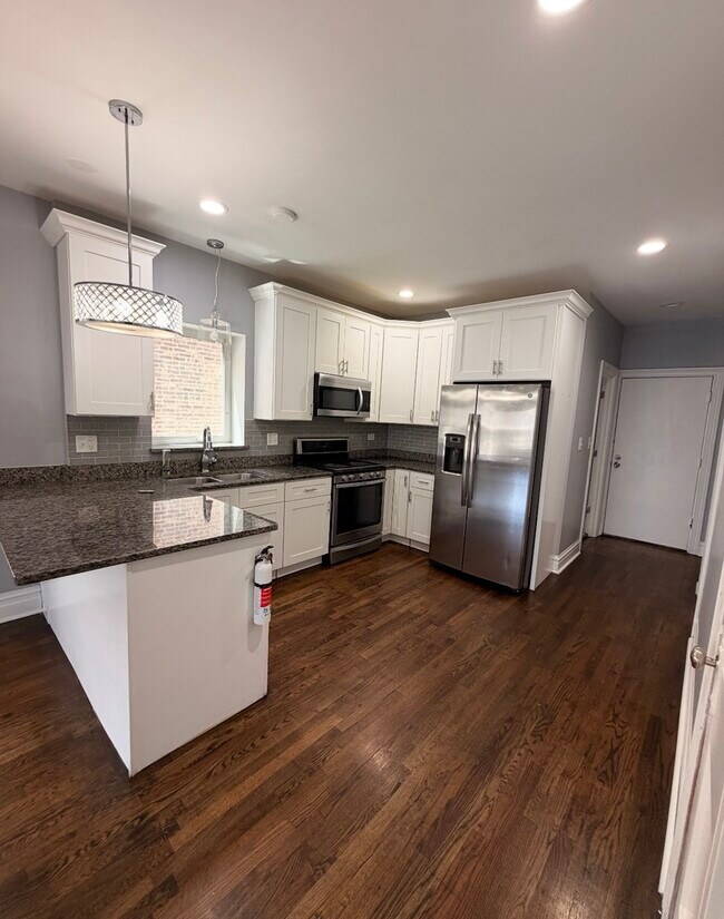Building Photo - 1220 S 59th Ct