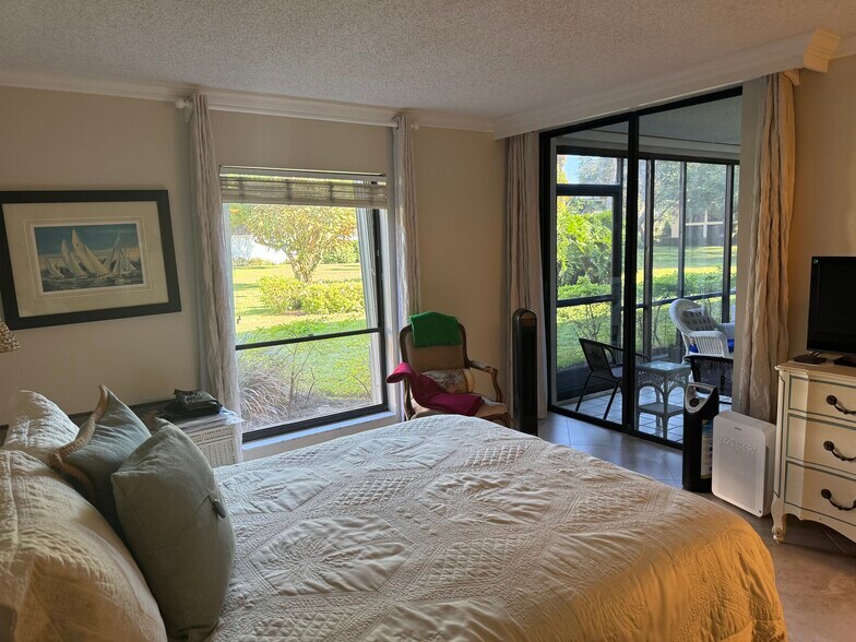 Primary Bedroom With Lanai Access - 14 Turtle Creek Dr