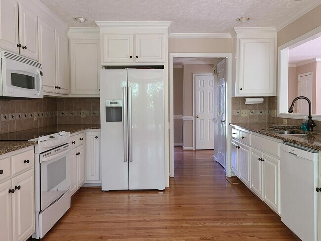 Building Photo - 4 BR, 2.5 BA in Woodlake Crossing