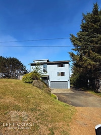 Building Photo - 6215 NE Oar Dr
