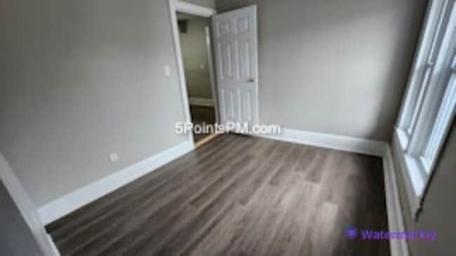 Building Photo - 9804 Miles Ave