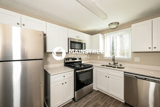 Building Photo - 4 Bedroom Pet-Friendly Home in STONE MOUNT...