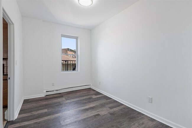 Building Photo - 310 Paterson Plank Rd