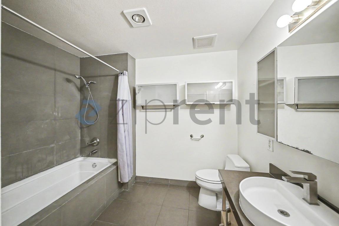 Building Photo - Unit #115