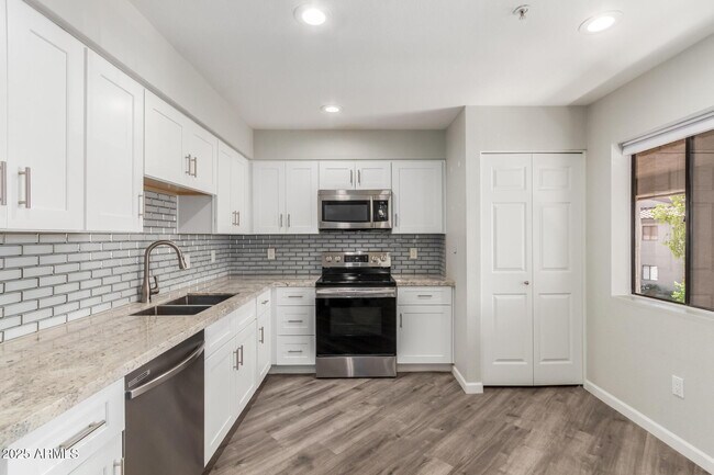 Building Photo - 9460 E Mission Ln