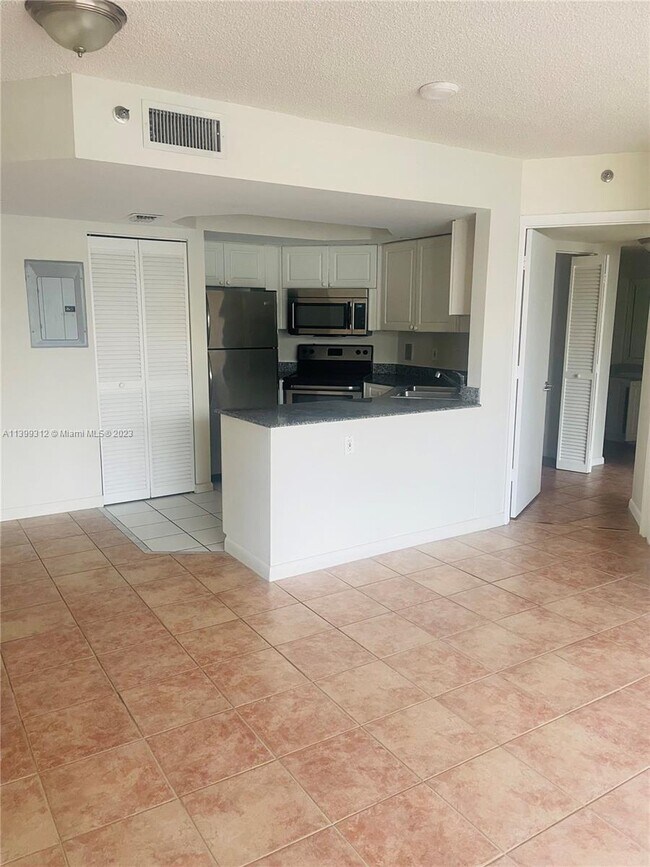 Building Photo - 8911 Collins Ave