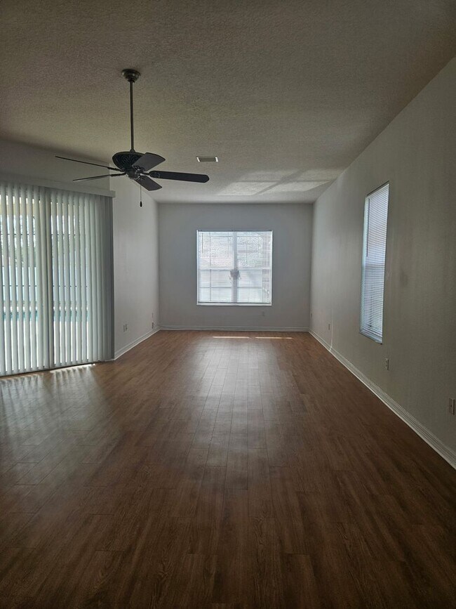Building Photo - 4 BEDROOM 3 FULL BATH HOME WITH A SCREENED IN POOL IN THE BEAUTIFUL PALM COAST